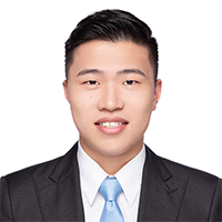 Professional headshot of a man wearing a suit and tie.
