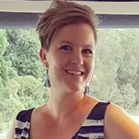 Portrait of a woman with short hair smiling