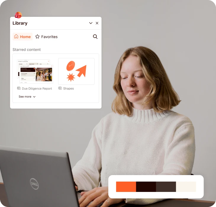 Woman using laptop with design library open