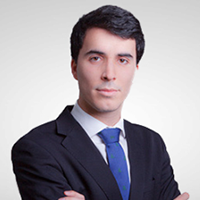 Professional man in suit and tie, relevant to excel and powerpoint formatting content.