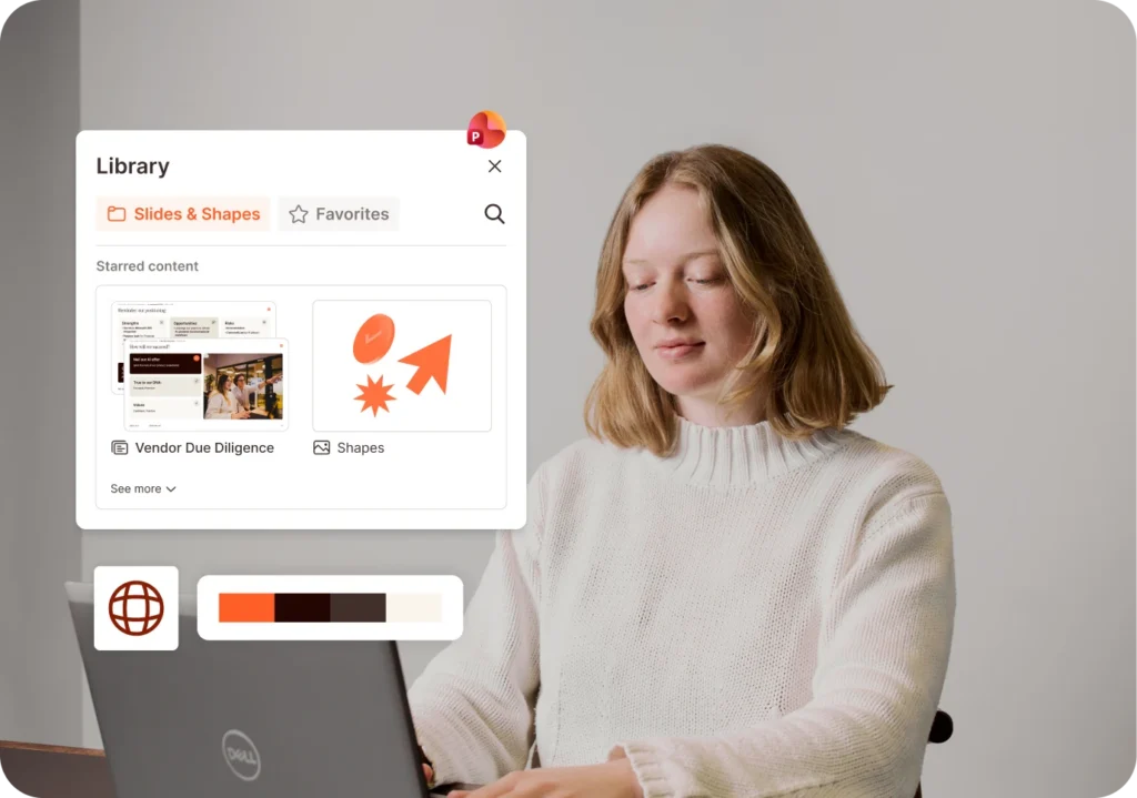 Woman using laptop with design library open on screen.